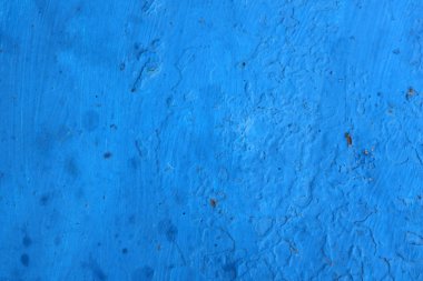 Duvardaki mavi düzensiz resim. Arka plan