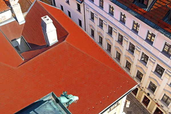 View from Michael's Gate, Bratislava, Slovakia. Downpipe in the form of gargoyle at the bottom . Top view — Stock Photo, Image