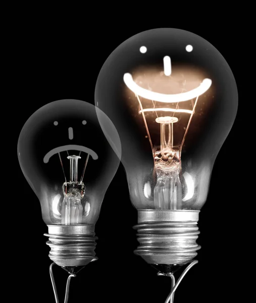 Dark and Shining Light Bulbs with Positive and Negative Emotion