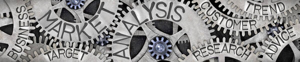 Horizontal group of tooth wheels with Market Analysis, Customer, Trend, Advice, Research and Target concept related words imprinted on metal surface