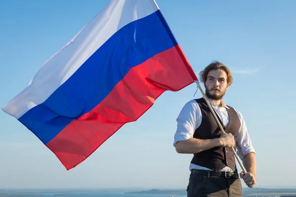ロシアの国旗とロシア人男性 — ストック写真