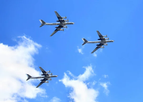 Three long-range bombers Tu-95 in flight Stock Picture