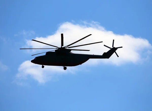 Side view of transport helicopter in flight — Stock Photo, Image