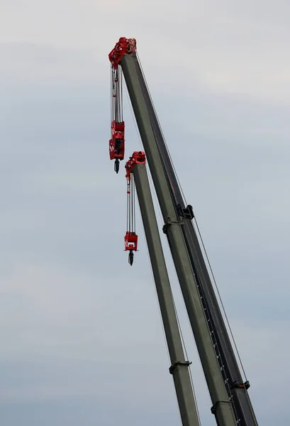 Two crane booms — Stock Photo, Image