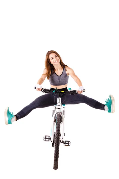 Chica en una bicicleta de montaña — Foto de Stock