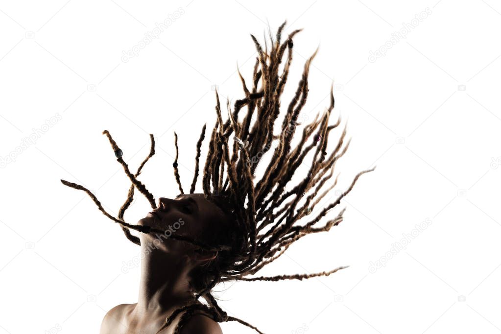girl with dreadlocks in the air