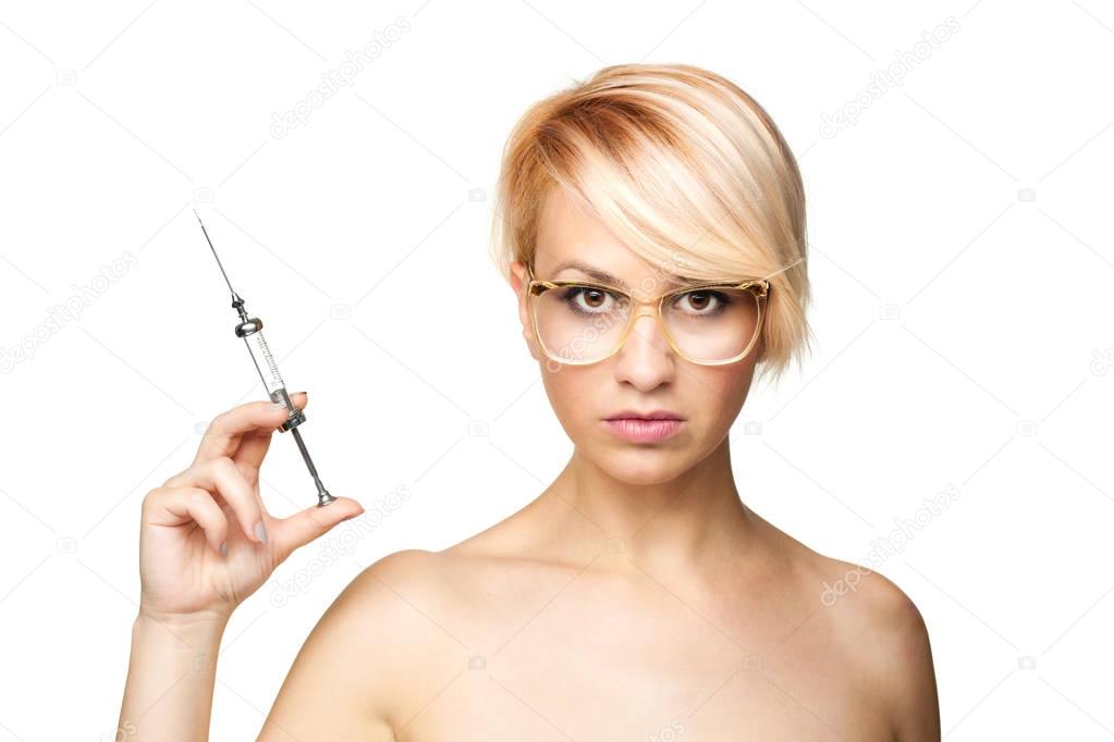 blond nurse with a syringe