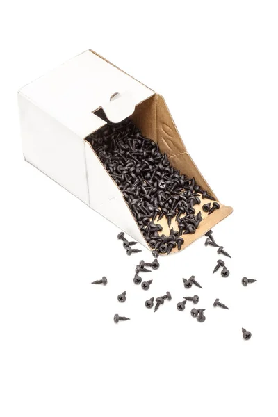 Group of black screws in a box — Stock Photo, Image