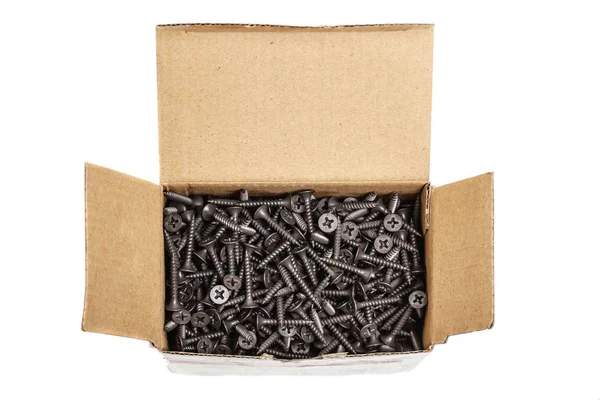 Группа черных винтов в коробке — стоковое фото