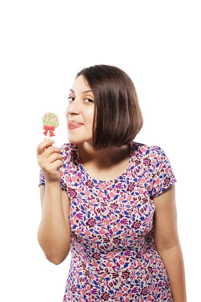 Chica en rosa con piruleta —  Fotos de Stock