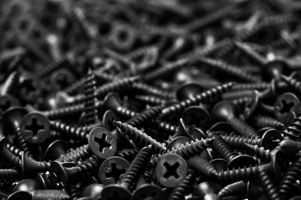Skupina černých šroubů — Stock fotografie