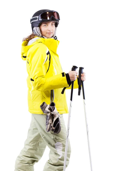 Skifahrerin in gelber Jacke — Stockfoto