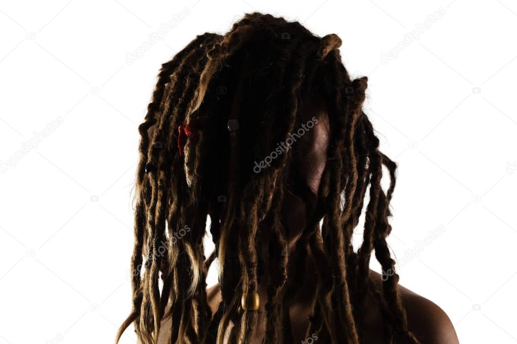girl with dreadlocks in front of her face