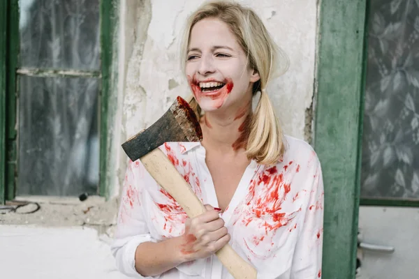 Zombie woman  with axe — Stock Photo, Image