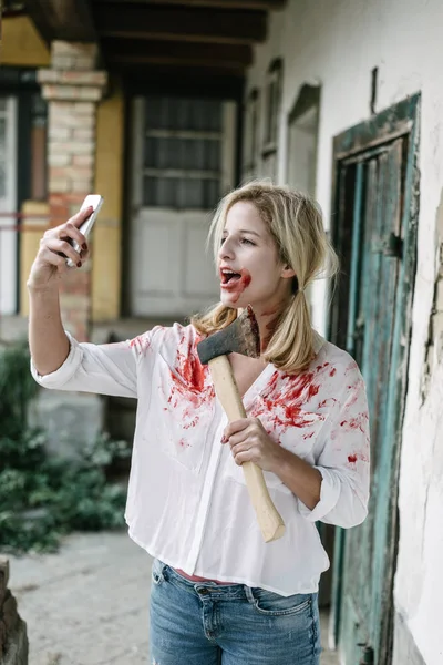 Zombie woman taking self portrait — Stock Photo, Image