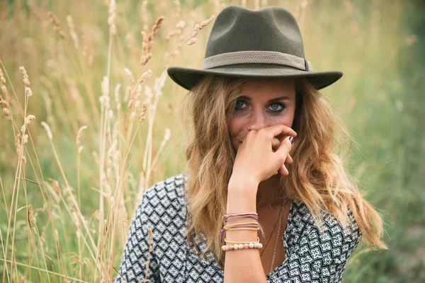 Beautiful cowgirl looking at camera outdoors — Stock Photo, Image