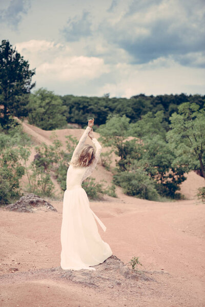 Bride. Beautiful bride outdoors. White wedding dress. Happy bride concept.