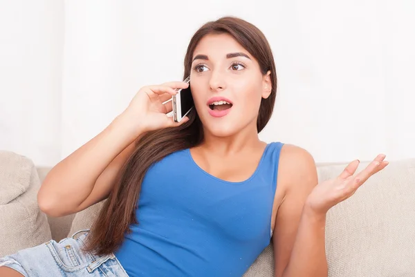 Portrait of beautiful girl talking by phone — Stock Photo, Image