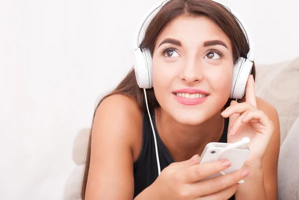 Young beautiful woman in headphones — Stock Photo, Image