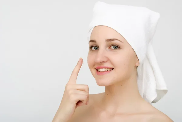 Young beautiful woman wrapped in towel — Stock Photo, Image
