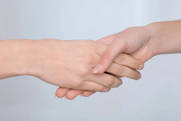 Business women shaking hands isolated on white background — Stock Photo, Image