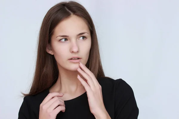 Junge überraschte Geschäftsfrau auf weißem Hintergrund — Stockfoto