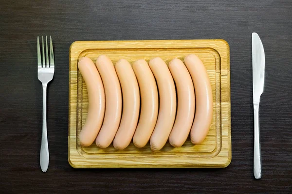 Fresh sausages on white background — Stock Photo, Image