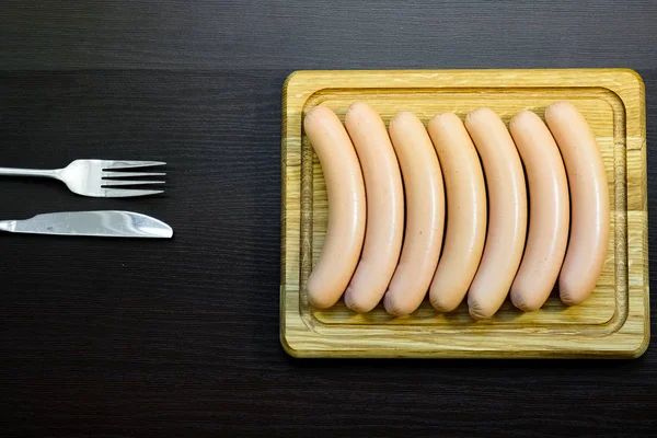 Fresh sausages on white background — Stock Photo, Image