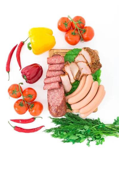 Assorted meat products including ham and sausages. Royalty Free Stock Photos