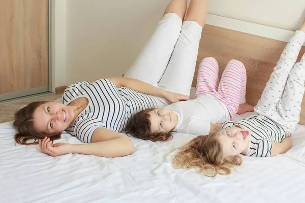 Happy loving family. Mother and her daughter child girl playing and hugging. — Stock Photo, Image