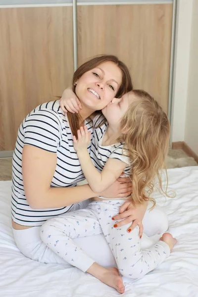 Happy loving family. Mother and her daughter child girl playing and hugging. — Stock Photo, Image