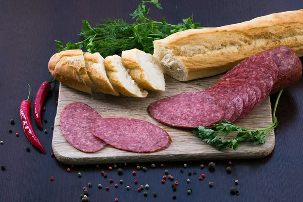 Composition with sausage on the table — Stock Photo, Image