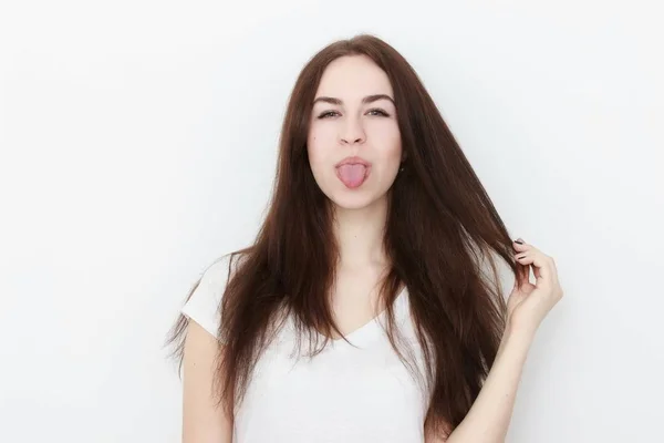 Young casual woman In pink blouse isolated over white background studio portrait — Stock Photo, Image