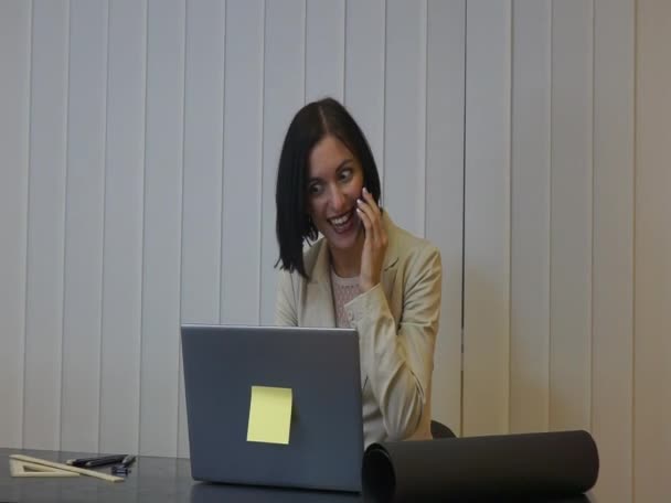 Cute female adult working on laptop computer — Stock Video