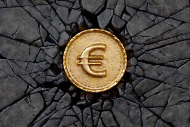 Altın madeni para ile Taş Kırma euro simgesi.