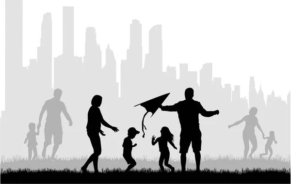 Familiensilhouette - urbaner Hintergrund. — Stockvektor