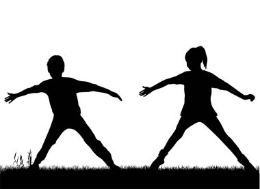 Spor yapan çocukların siluetleri.
