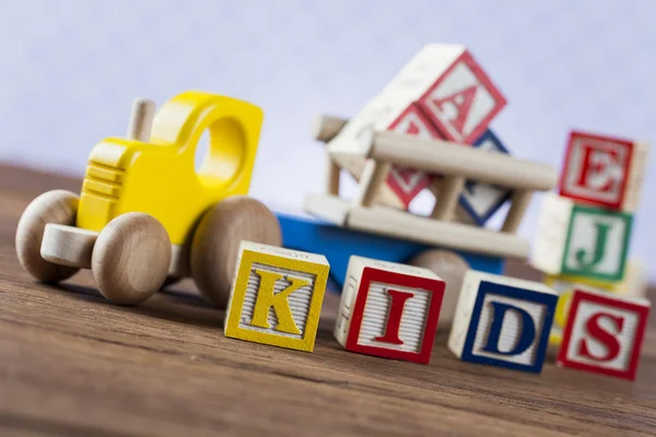 Juguete Children 's World sobre fondo de madera . — Foto de Stock