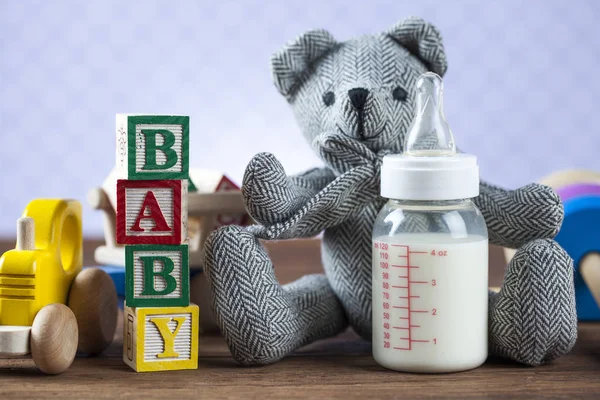 Children's World toy on a wooden background. — Stock Photo, Image