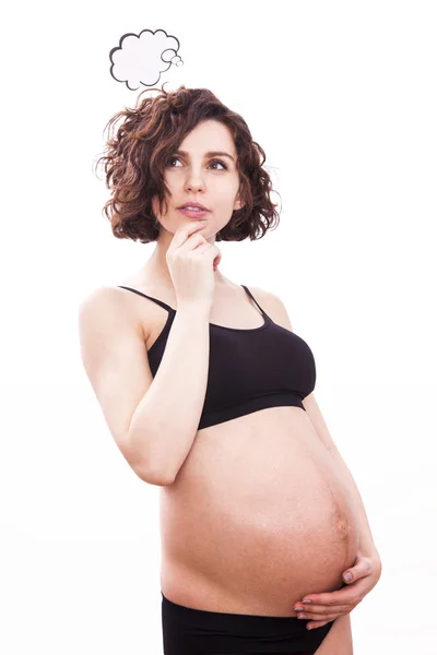 Pregnant woman thinks about her baby. — Stock Photo, Image