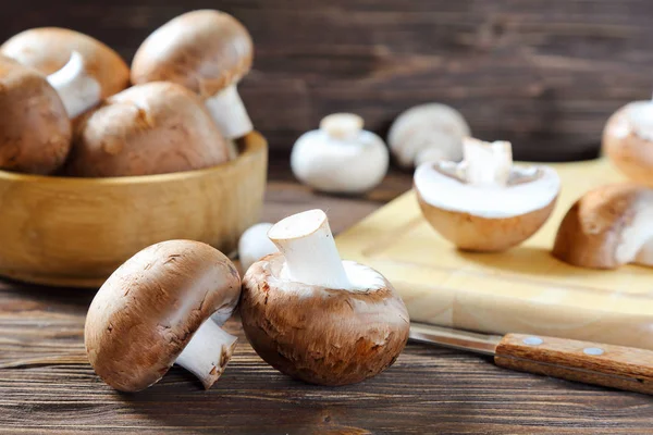 Portobello champignon on a kitchen wooden table — Stock Photo, Image