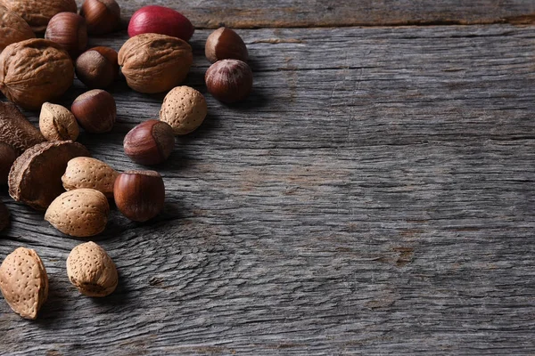 Mixed Nuts on Wood Table — Stock Photo, Image