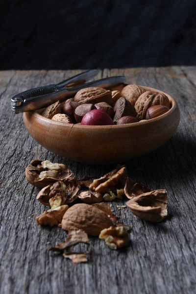 Nut Bowl and Cracked Walnuts — Stock Photo, Image
