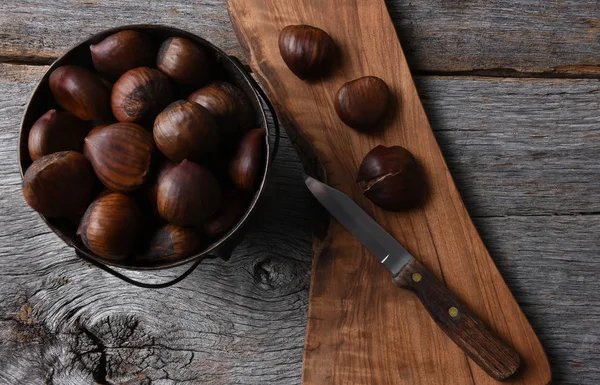 Bucket of Chestnuts and Knife — Stock Photo, Image