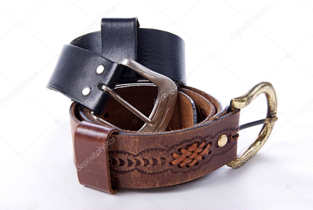 two old leather belts isolated on white