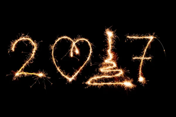HAPPY NOVO ANO 2017 escrito com fogos de artifício como fundo — Fotografia de Stock