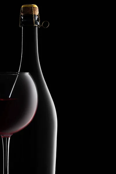 Silhouette of a Bottle and Red Wine Glass — Stock Photo, Image