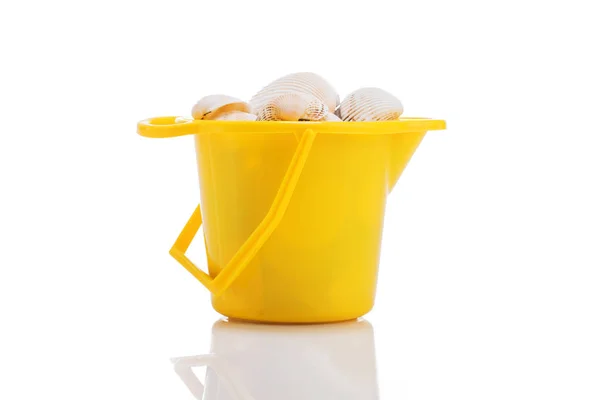 Baby beach sand toys. Plastic shovel and mussels isolated. — Stock Photo, Image