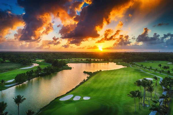 Aerial view of tropical golf course at sunset, Dominican Republi — Stock Photo, Image