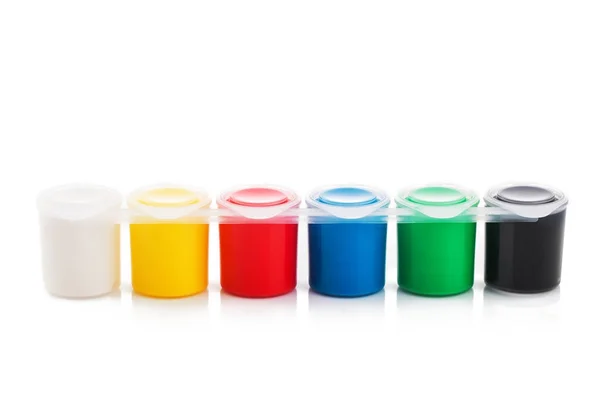Large set of gouache paint cans in a row. Colorful paints isolat — Stock Photo, Image